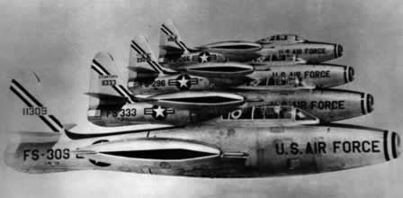 Four F-84G jets in formation