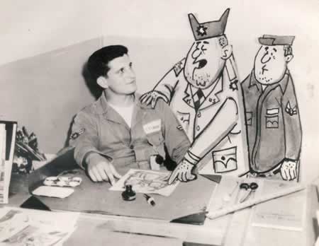 John Stinger, age 18, at his desk at the England AFB newspaper "The Tiger Talk"