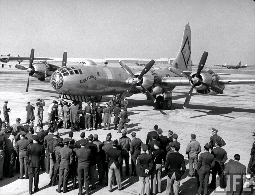 Dignitaries greet the crew of Boeing B-50A-5-BO Superfortress 46-010, Lucky Lady II, at Carswell Air Force Base