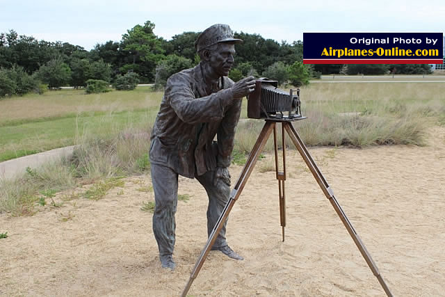 Camera man capturing the Wright Brothers first flight